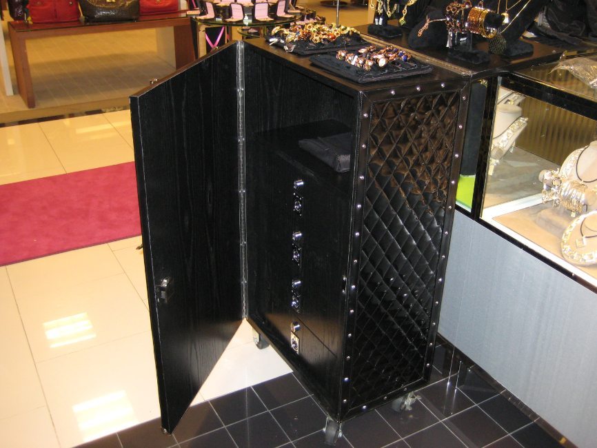 secure retail display trunk  - custom freestanding displays by Visual Millwork