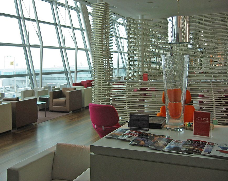 image of commercial interior project featuring custom seating area for Virgin Atlantic Lounge at JFK by  Visual Millwork